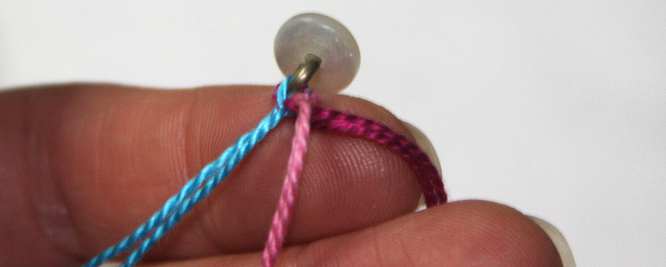Thread embroidery floss through shank for braided bracelet.