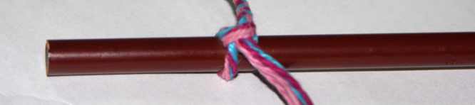 Tie knot pencil braided bracelet.
