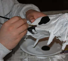 Make a paper mache cow