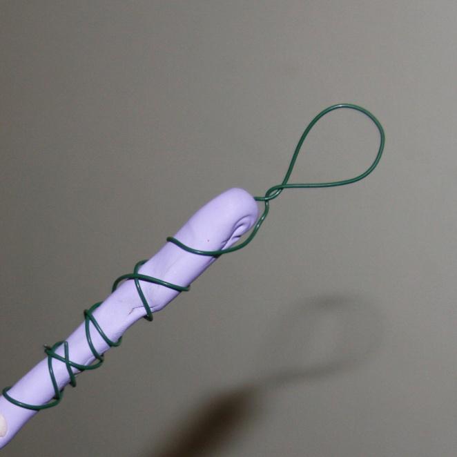 Children's crafts adding wire loop to wand